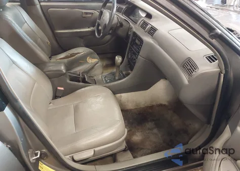 1999 Toyota Camry Le z USA, uszkodzony, nr VIN 4T1BG28K6XU609176